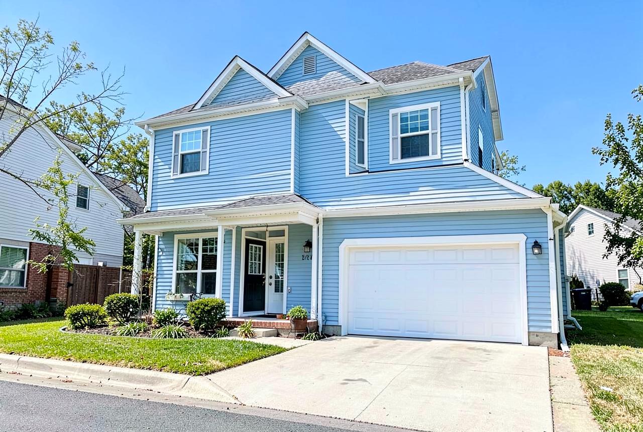 Light blue two-story Sacramento home after a completed exterior remodeling and siding project